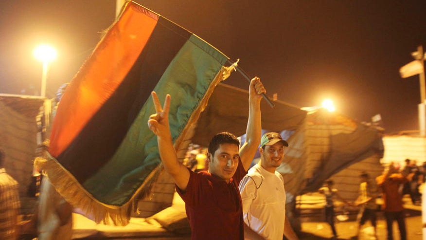 Man Does Peace Sign in Libya.jpg